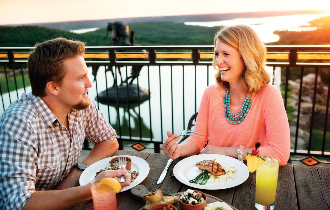 Couple eating with a view of Table Rock Lake in Branson, MO.