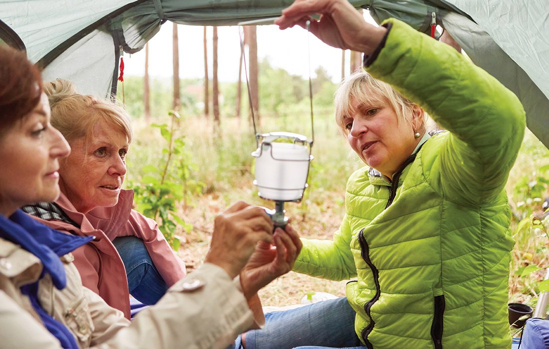 Stock photo of women camping