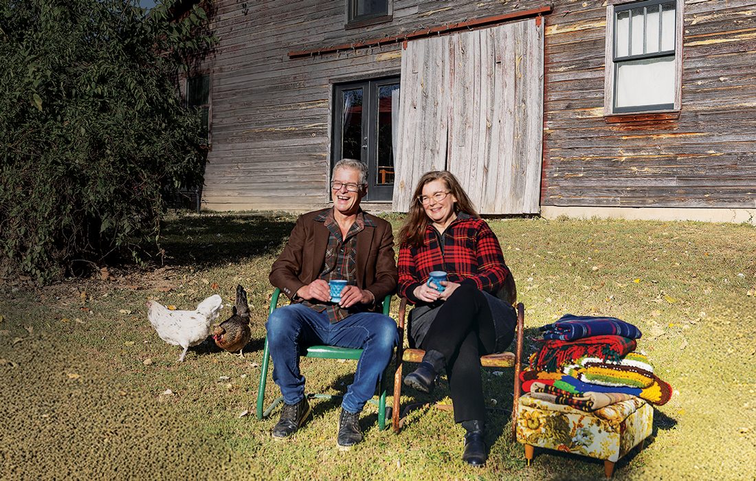 Speed family sitting outdoors.