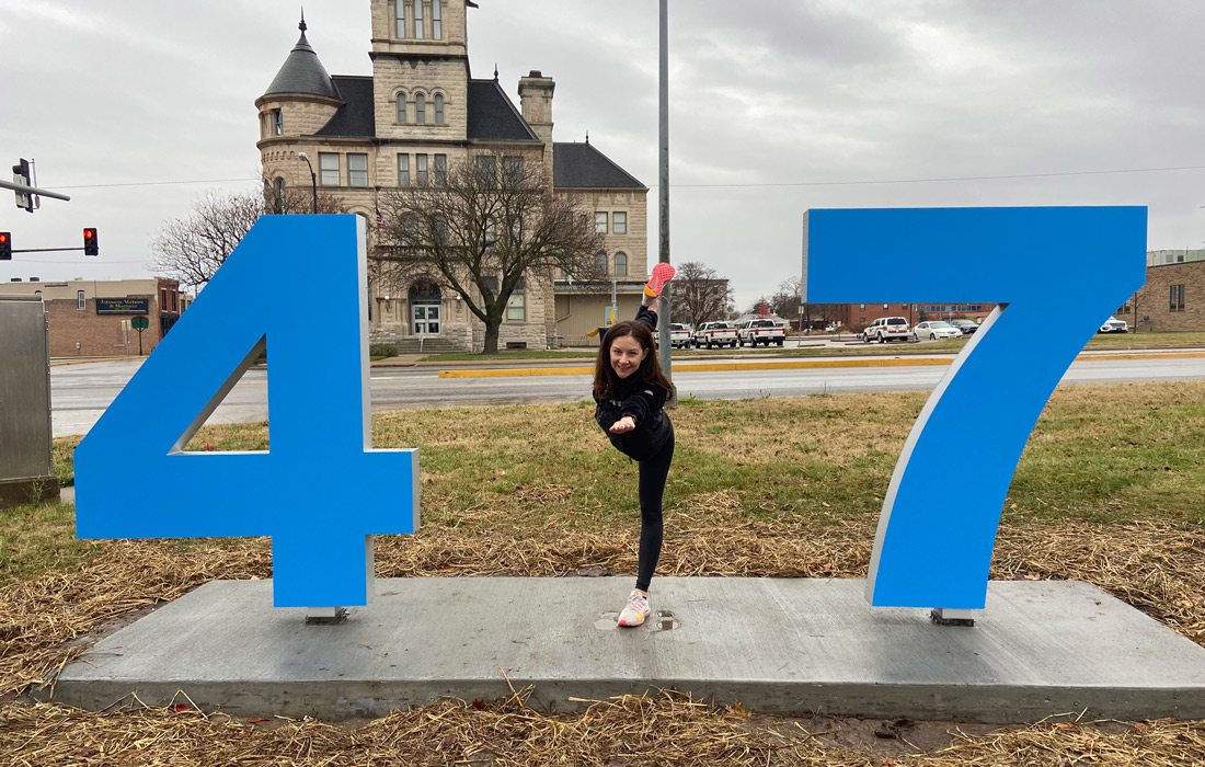 Logan Aguirre at the #417betheone sign.