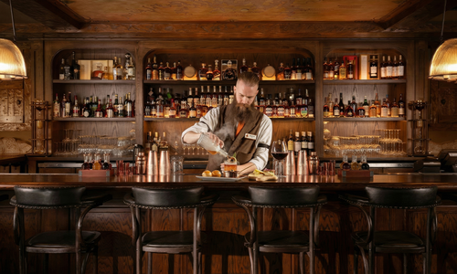 A bartender making a drink at Harry's Cocktail Lounge at Big Cedar Lodge in the Ozarks.