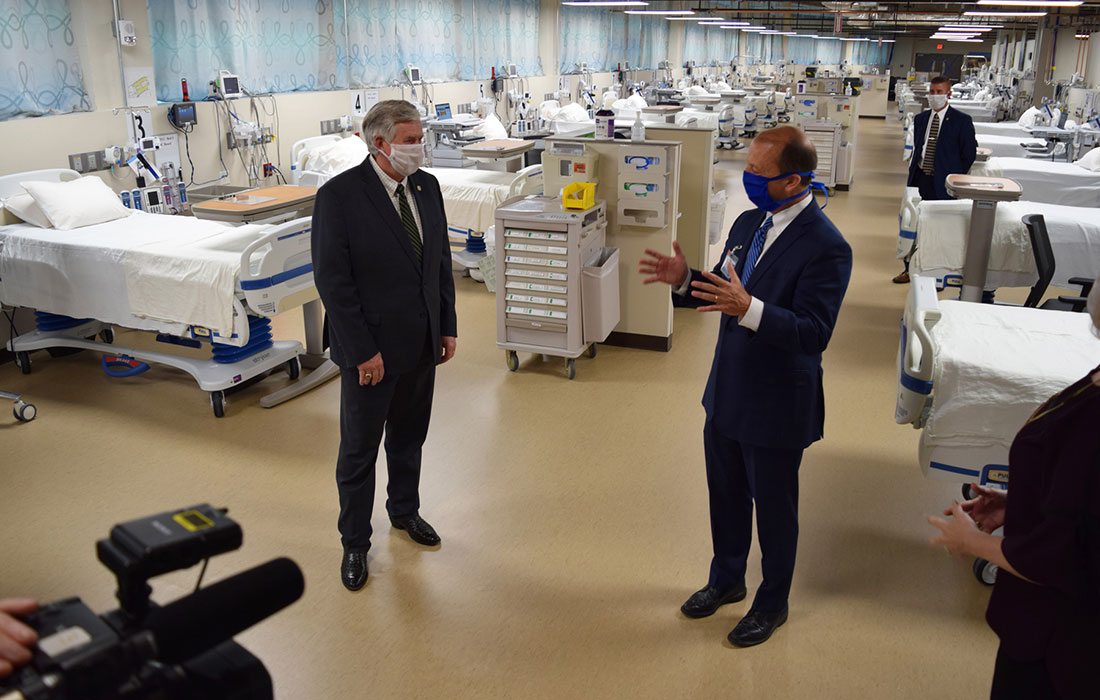 Missouri Governor Mike Parson and CoxHealth CEO Steve Edwards in COVID-19 unit