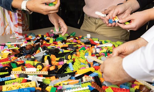 People using Lego bricks.