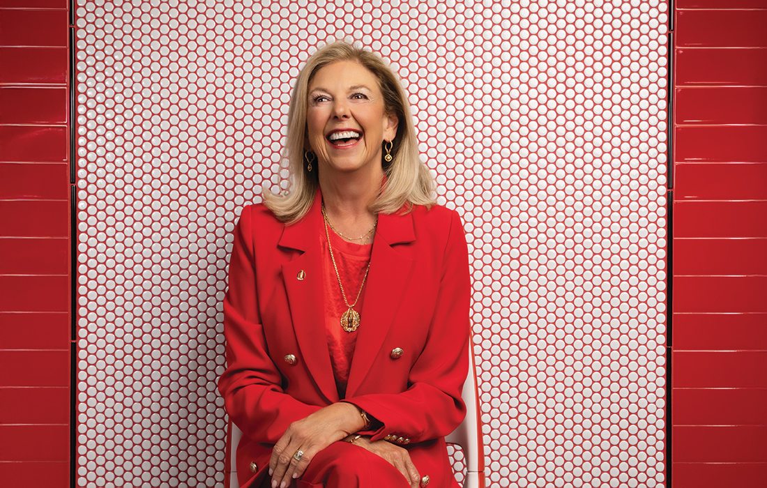 Sally Hargis against red backdrop