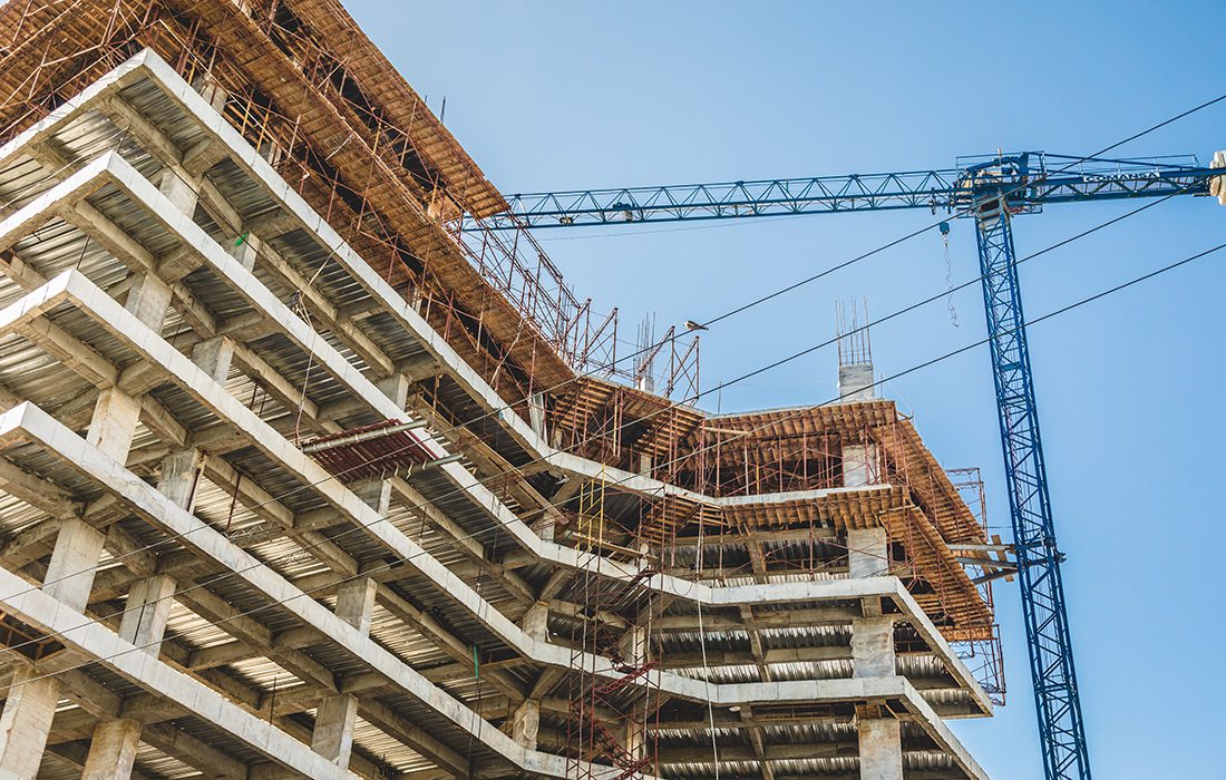 Building construction site with a crane