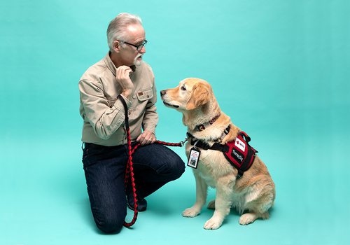 Walter Roberts and his therapy golden retriever Choppy