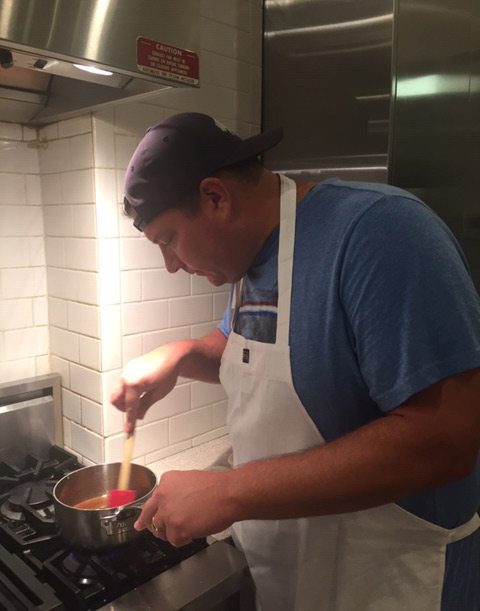 Dylan Whitaker cooking at viking cooking class Greenwood, MS