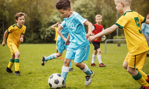 Kids play a soccer game.