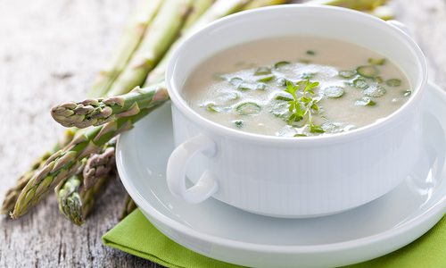 Cup of creamed asparagus soup