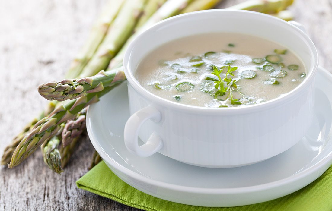 Cup of creamed asparagus soup