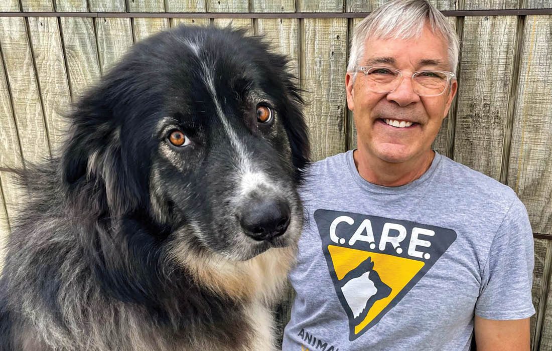 A C.A.R.E. Volunteer with dog