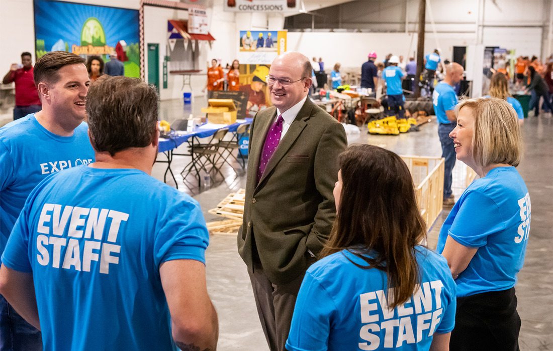 Dr. Hal Higdon with OTC staff at the Technical Education Showcase in 2018