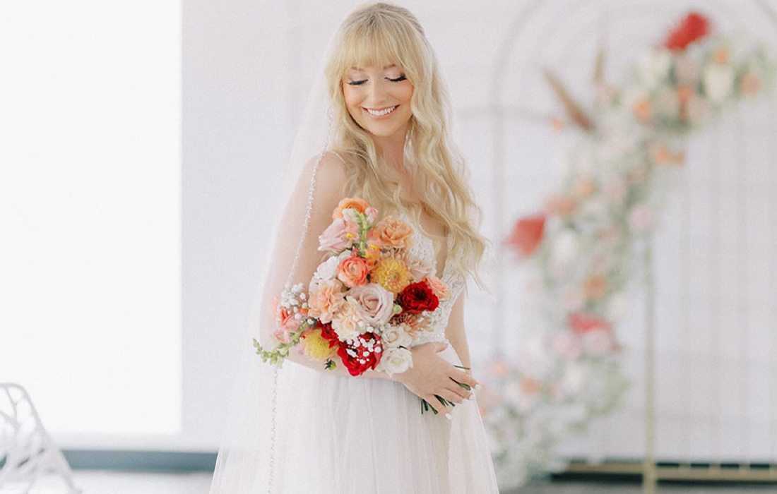 Bride with flowers from Dreamy & Darling