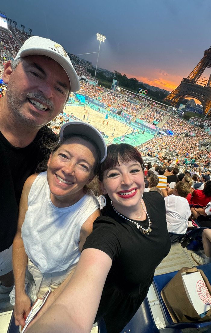 Elizabeth VanFosson with her parents in Paris