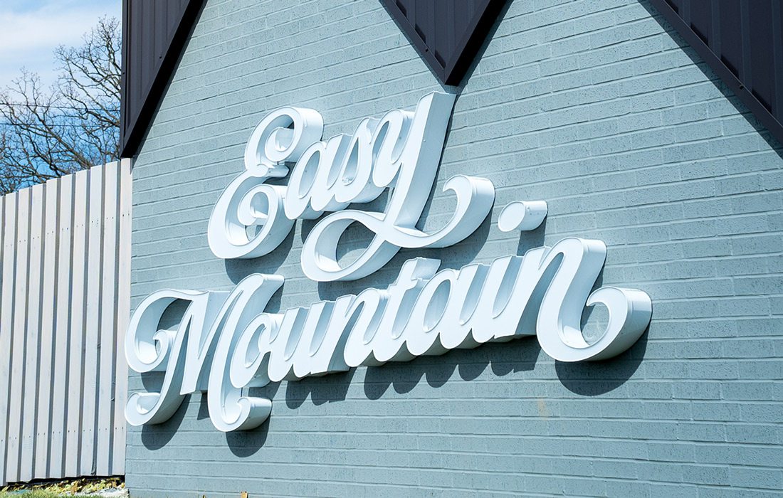 Easy Mountain logo exterior