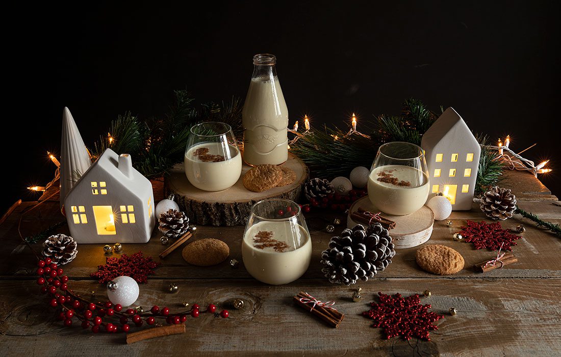Eggnog with Christmas ornaments and decor