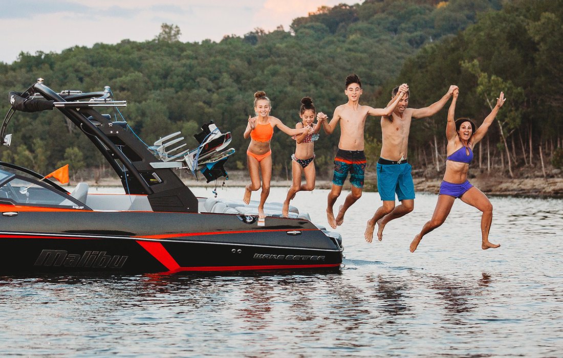 The Morgan family jumping into Table Rock Lake