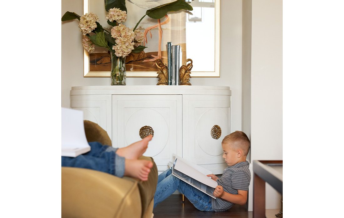 Erica kids reading in their home.