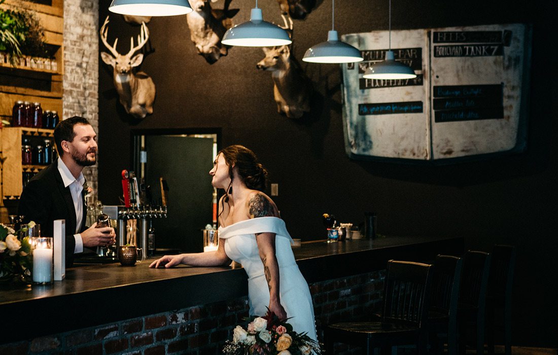 Bride and groom at Missouri Spirits in downtown Springfield MO