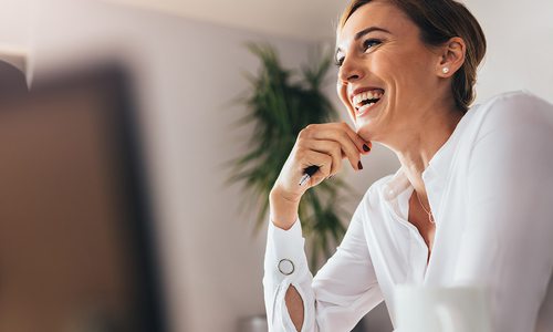 Happy women in a white blouse