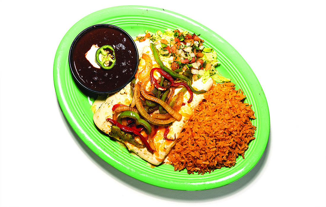 A green dish with peppers, chicken enchiladas, and mexican rice.