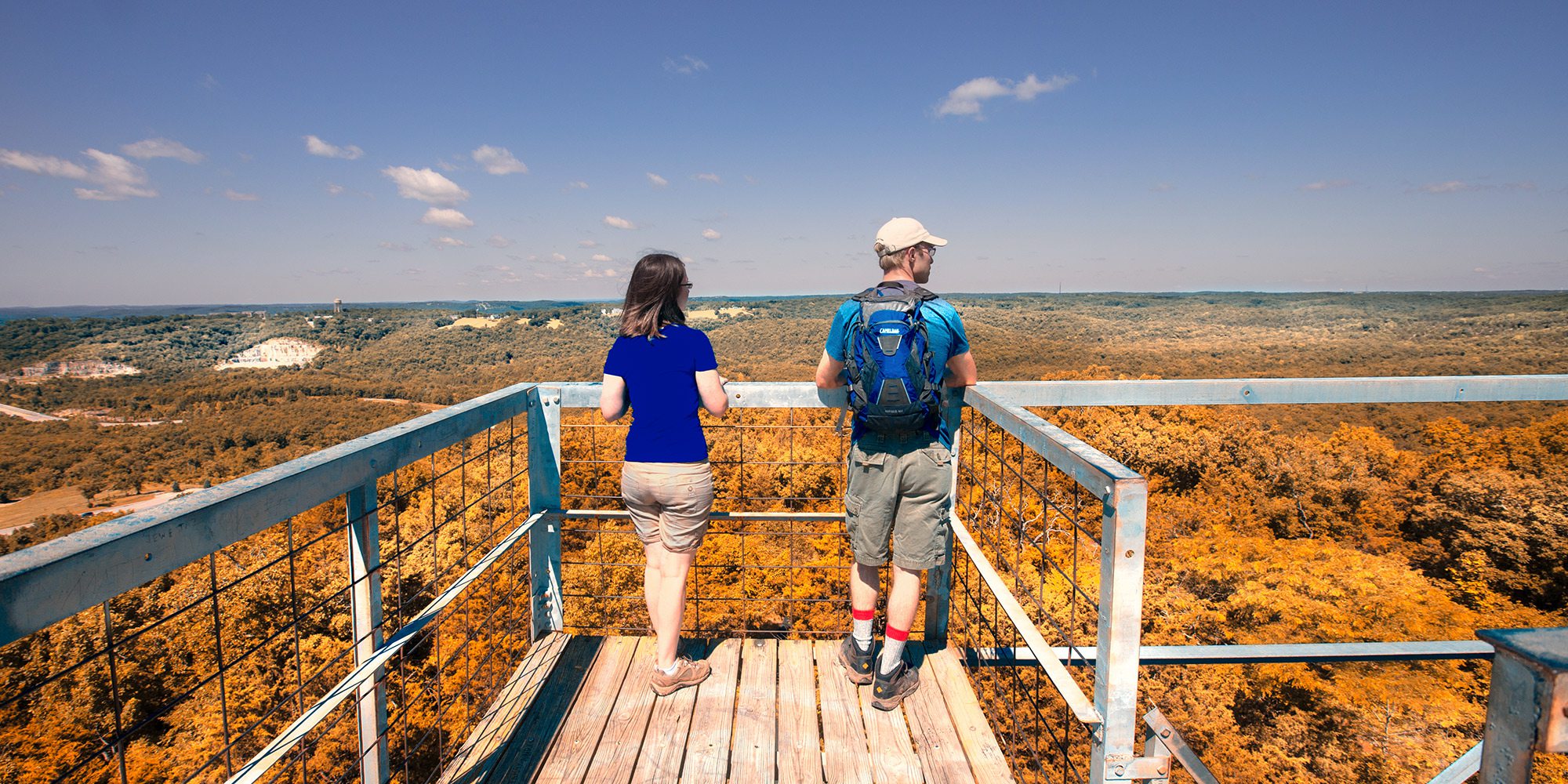 Couple at an overlook along the Glade Trail in the Ruth and Paul Henning Conservation Area