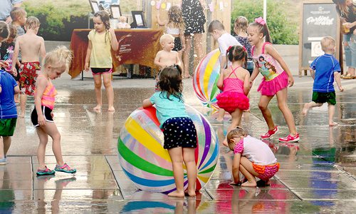 Kids splashing at Farmers Park