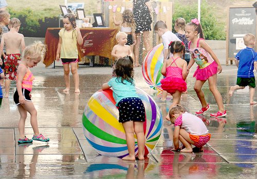 Kids splashing at Farmers Park