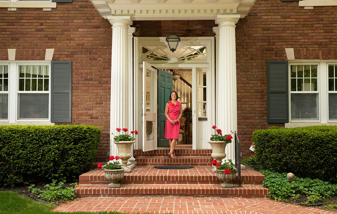 Gail Smart outside her beautiful home in Springfield, MO