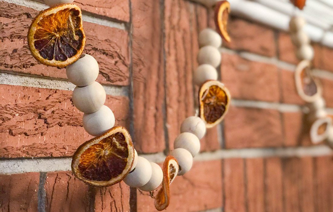 Beaded orange garland made by Heather Kane