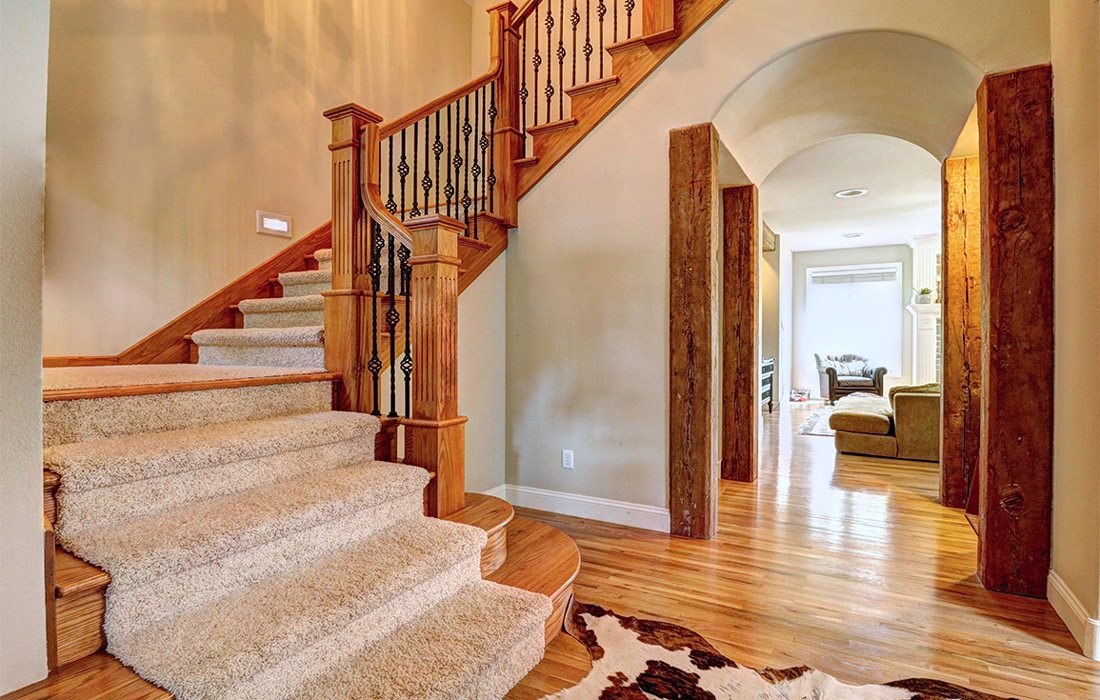 Before photo of staircase from Homes of the Year 2022