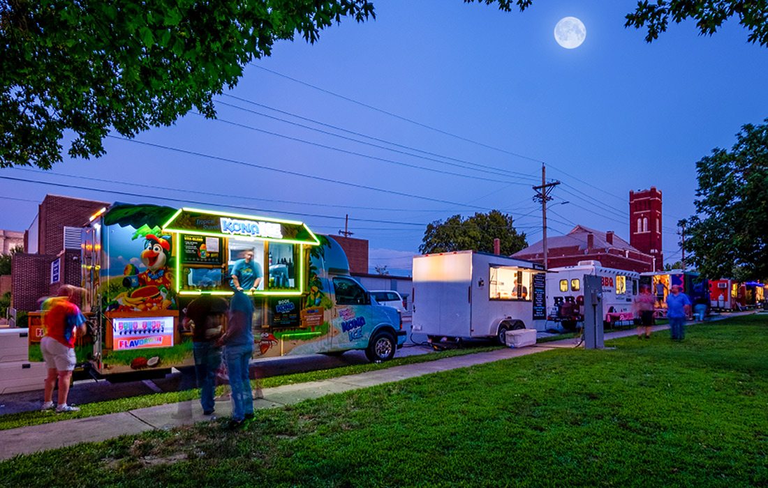 Food trucks lined up at night in Carthage, Missouri