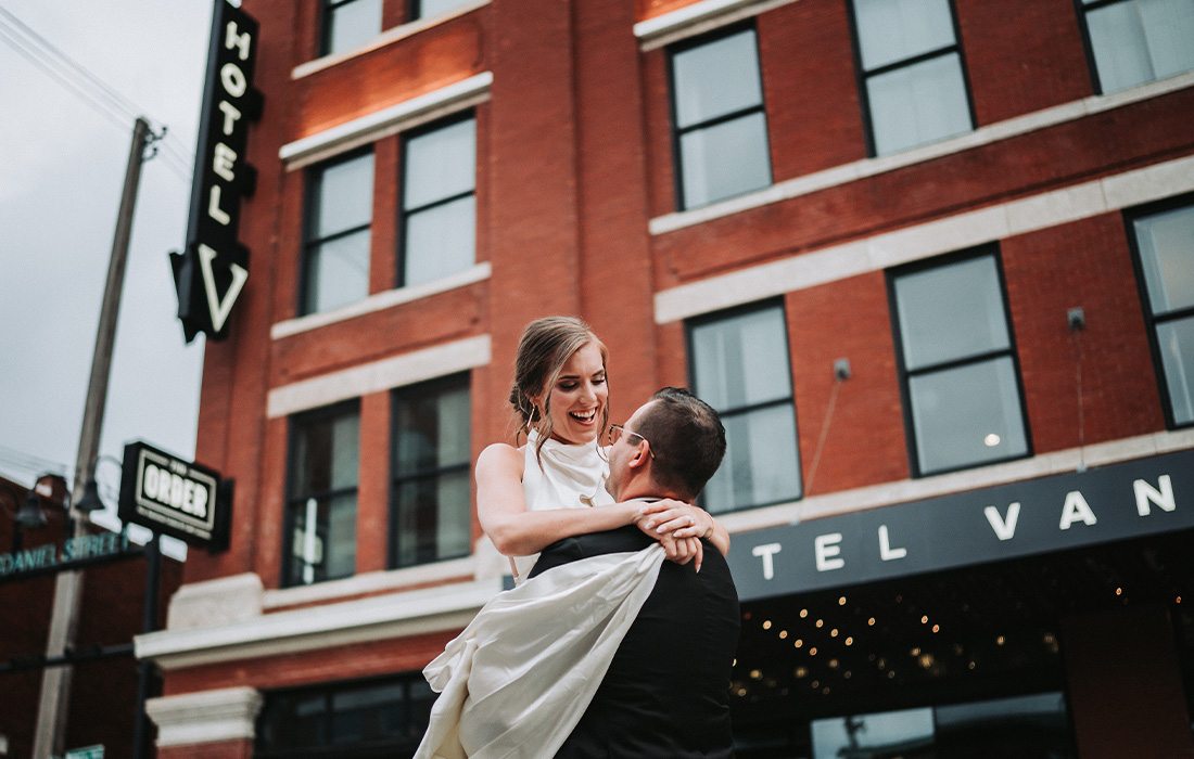 Bride and groom outside Hotel Vandivort.