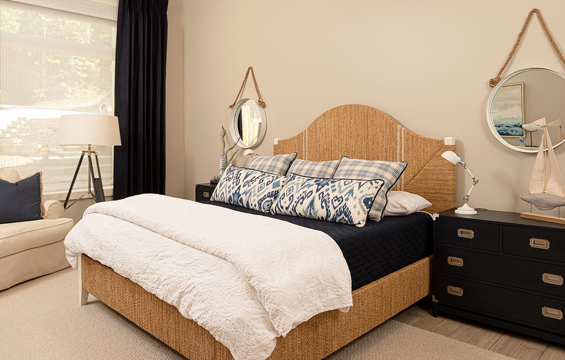 Bedroom with blue and white bedding