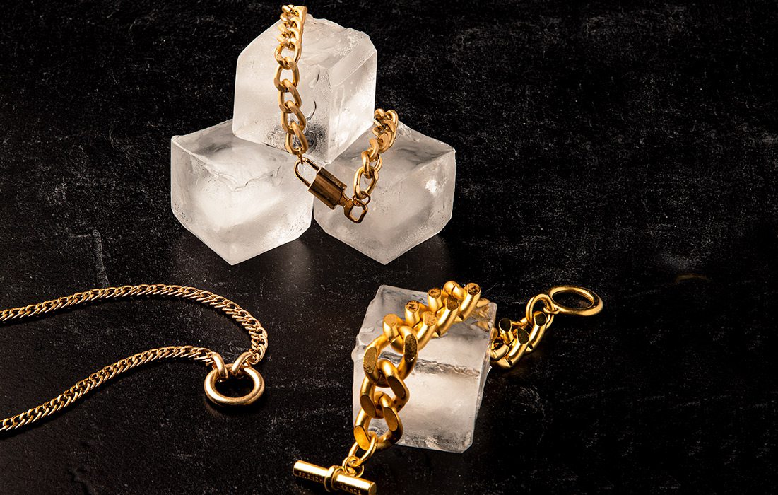 Jewelry resting on ice cubes