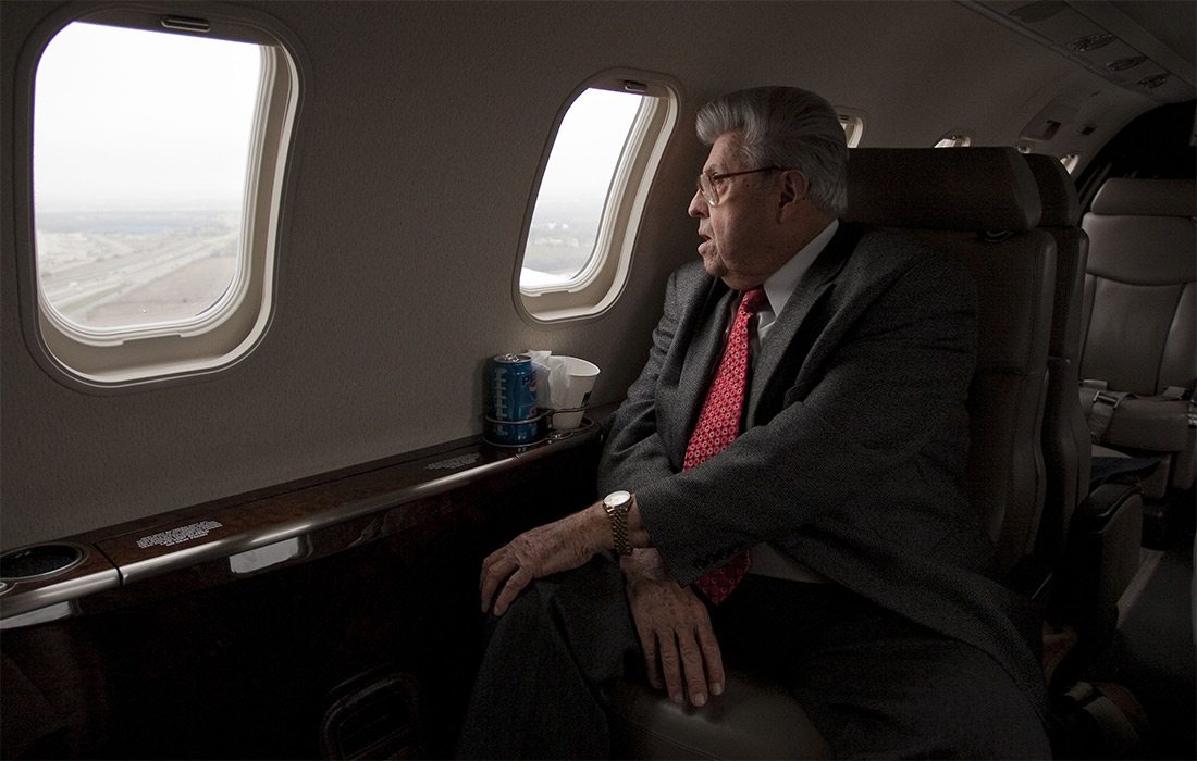 John Q. Hammons on his private jet