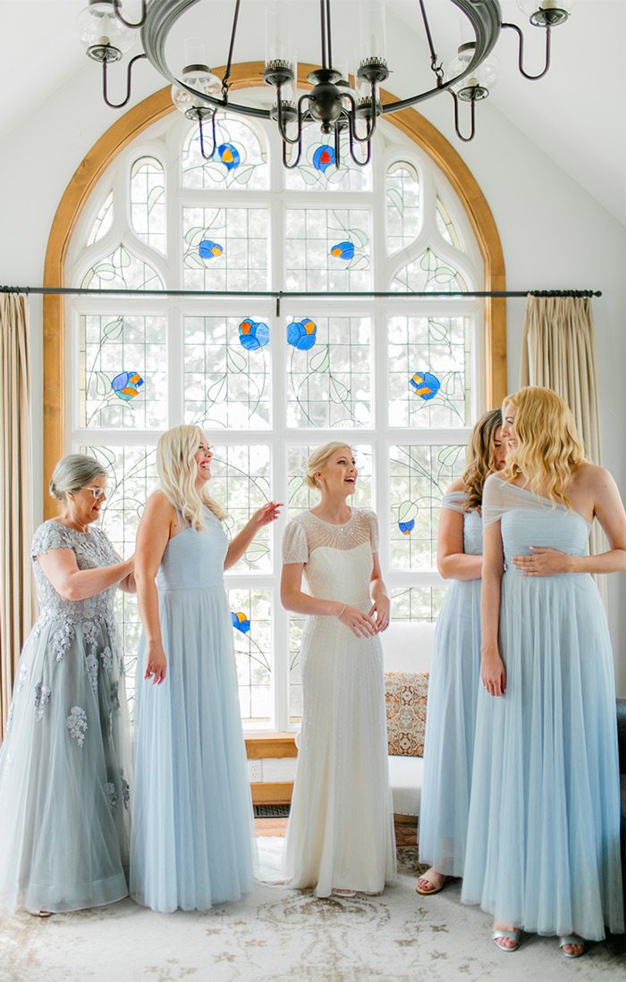 Kelly’s sister and two cousins were bridesmaids, and the group got ready at the Carriage House Cottage at Big Cedar Lodge. \