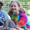 Young girl with a lemur at Cub Creek Science Camp in Rolla, Missouri