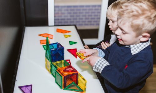 Young children playing and learning at Itty Bitty City in Springfield MO