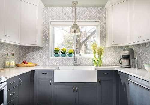 White and grey chevron kitchen tile backsplash