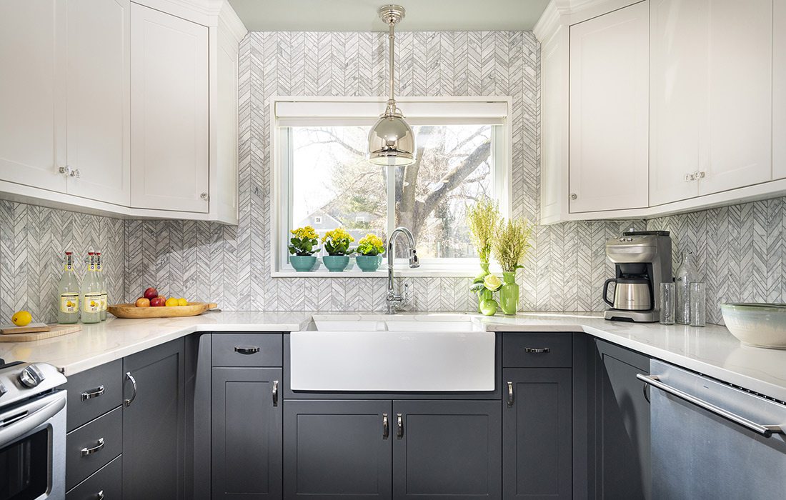 White and grey chevron kitchen tile backsplash