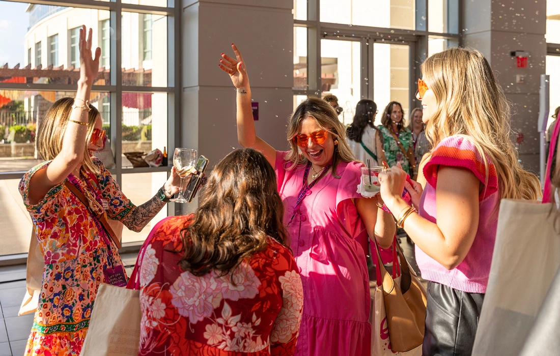 Women celebrate at Ladies Who Launch in Branson, Missouri.
