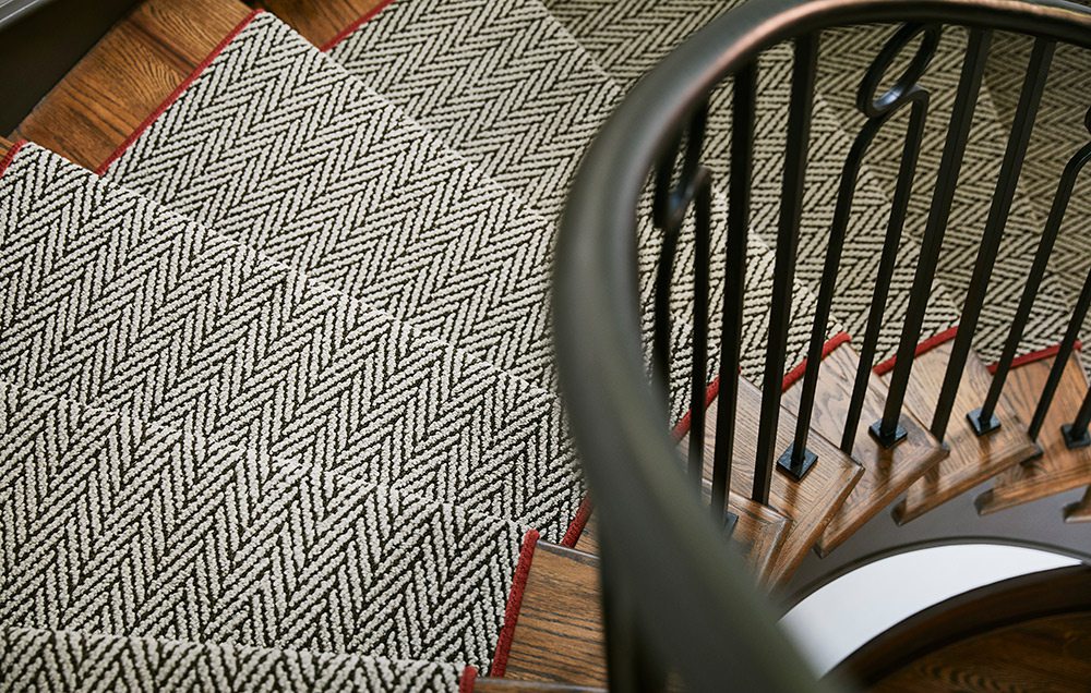 Geometric-print carpet on spiral staircase