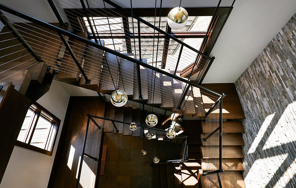 Dramatic staircase in home at Table Rock Lake