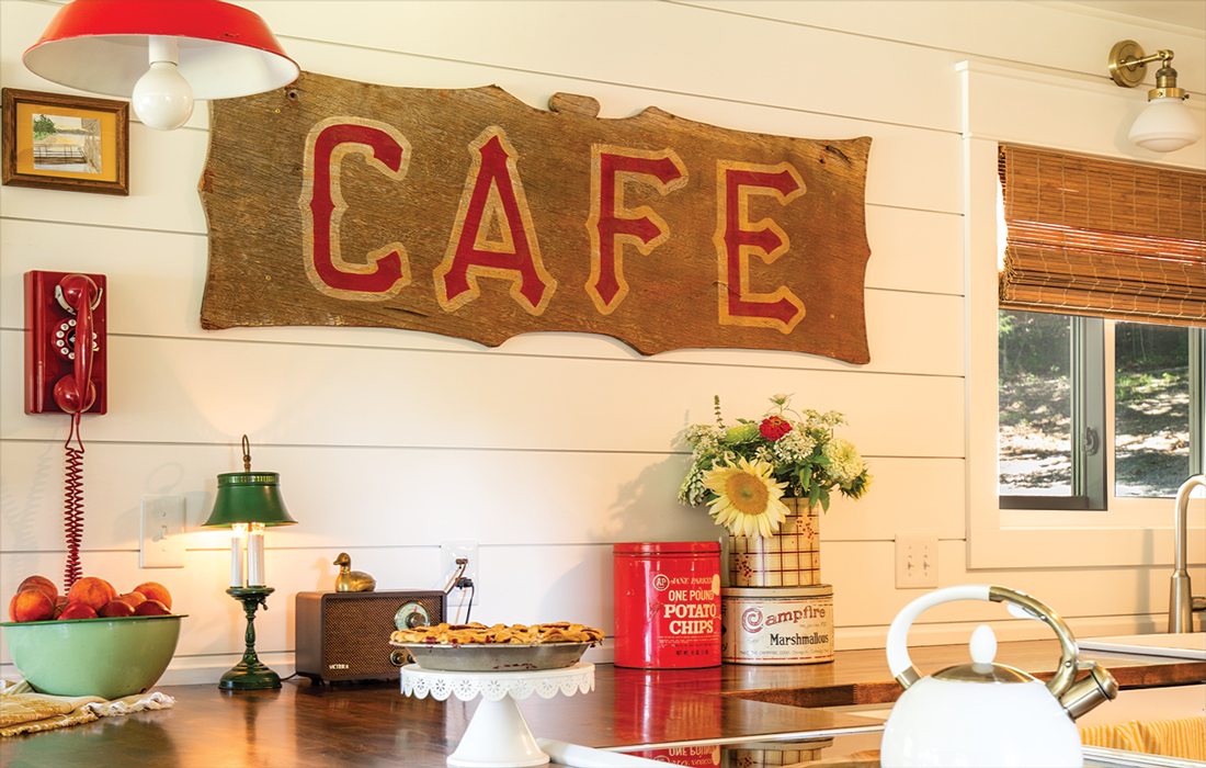 Cafe sign in kitchen at lakeside cabin AirBnB in southwest Missouri