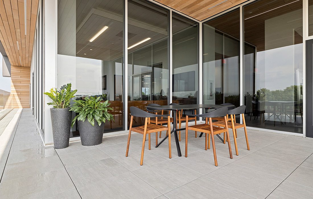 Outdoor seating infront of large windows