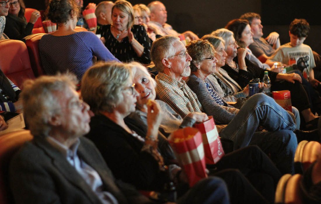 People watching a movie at The Moxie in Springfield MO