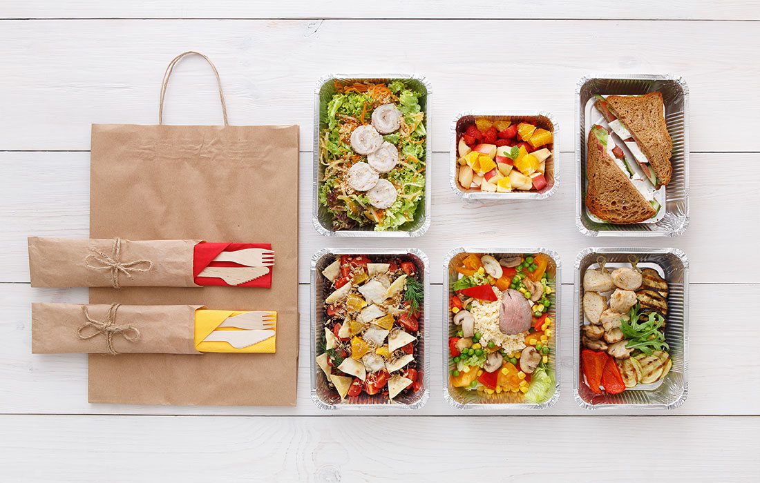 An assortment of meals and food sit in their kits, ready to eat.