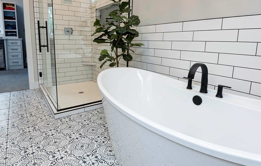 Modern farmhouse master bathroom design with traditional elements by Eck Group Building in southwest Missouri