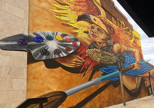 Athena mural located outside Fenix Fayetteville Art Gallery
